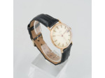 OMEGA Classique or R565